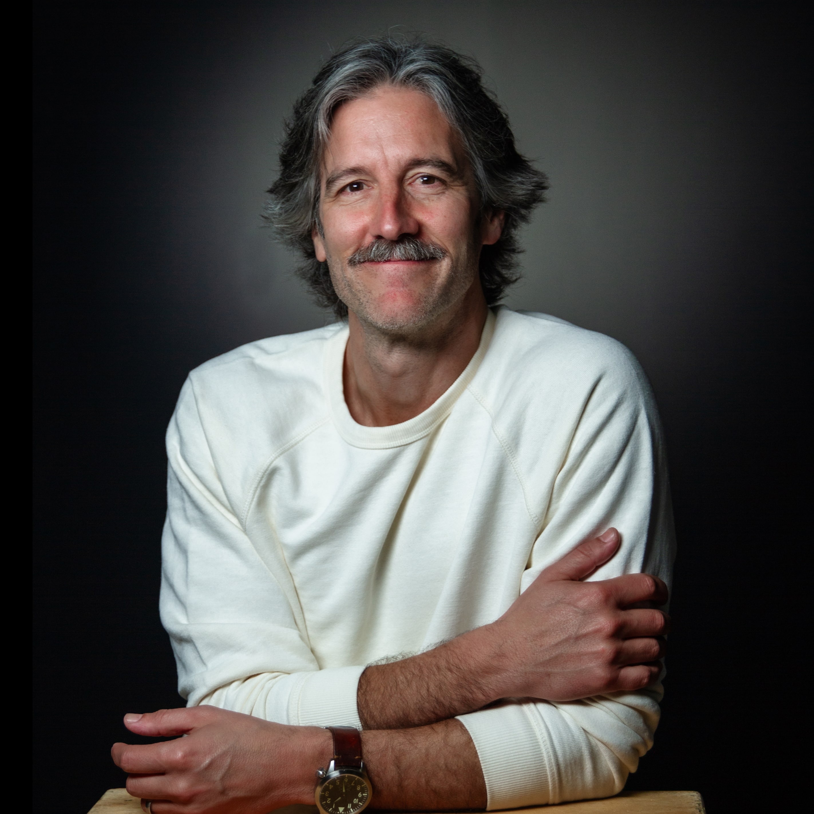 Photo of Noah wearing a white sweatershirt. I wonder how long that will stay clean.